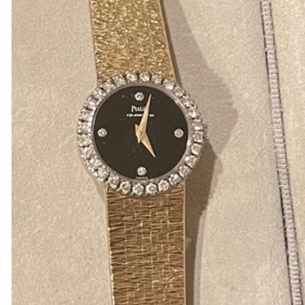 Piaget Gold Watch with Black Dial and Diamond Bezel